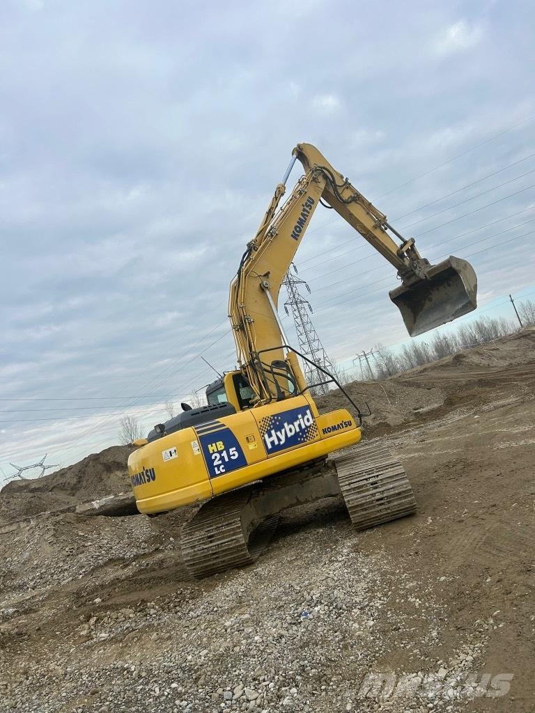 Komatsu HB 215 LC-1 Bommar och stickor