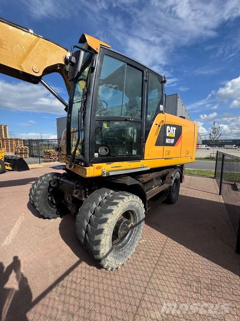 CAT 318 Hjulgrävare