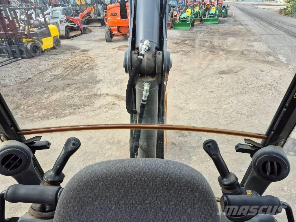 John Deere 310 Grävlastare