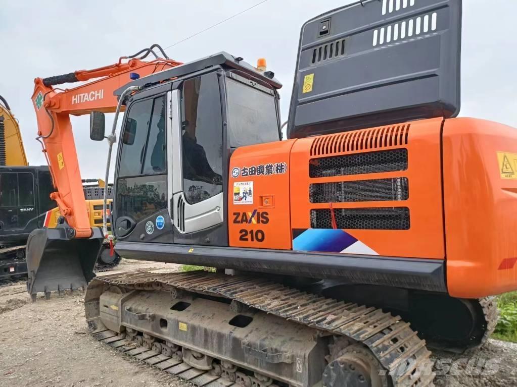 Hitachi ZX210 Bandgrävare