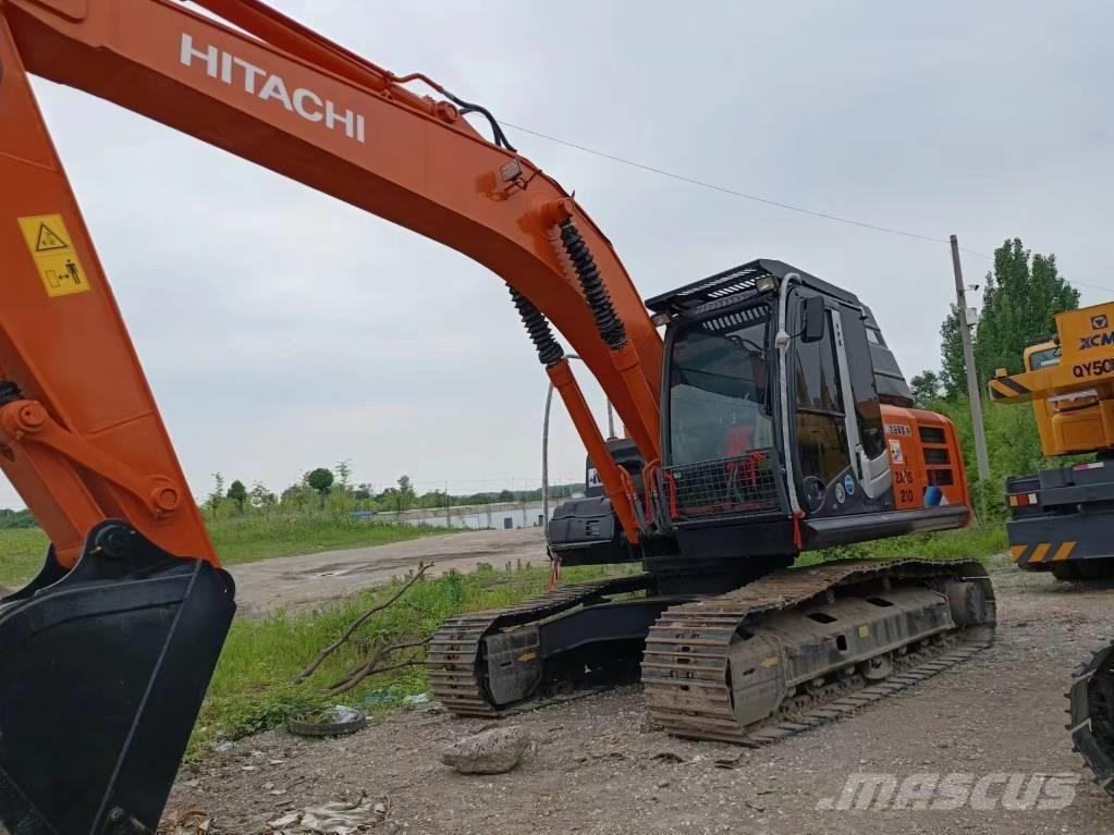 Hitachi ZX210 Bandgrävare