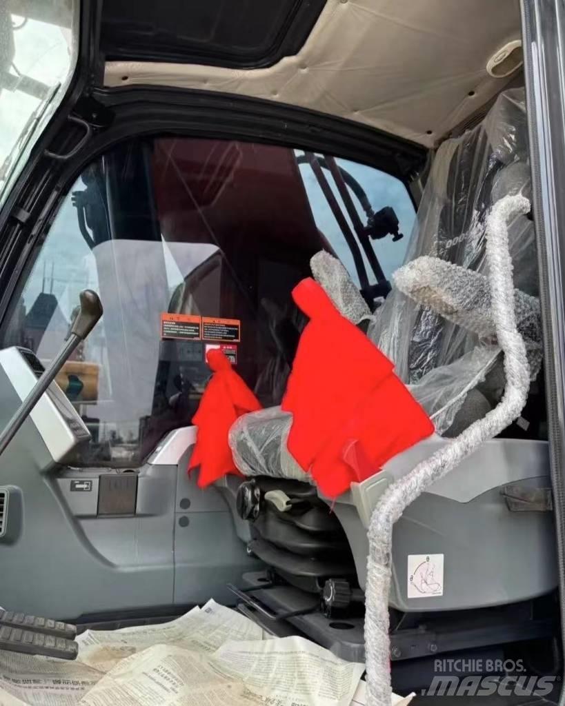 Doosan DX 225 Bandgrävare