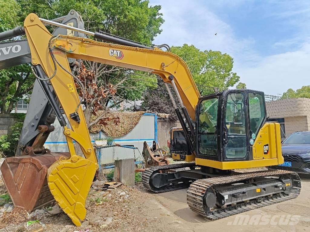 CAT 310 Bandgrävare
