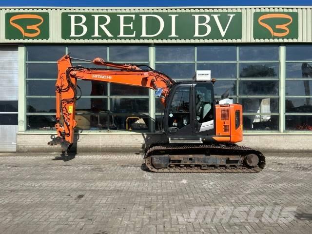 Hitachi ZX 135 US-6 Bandgrävare