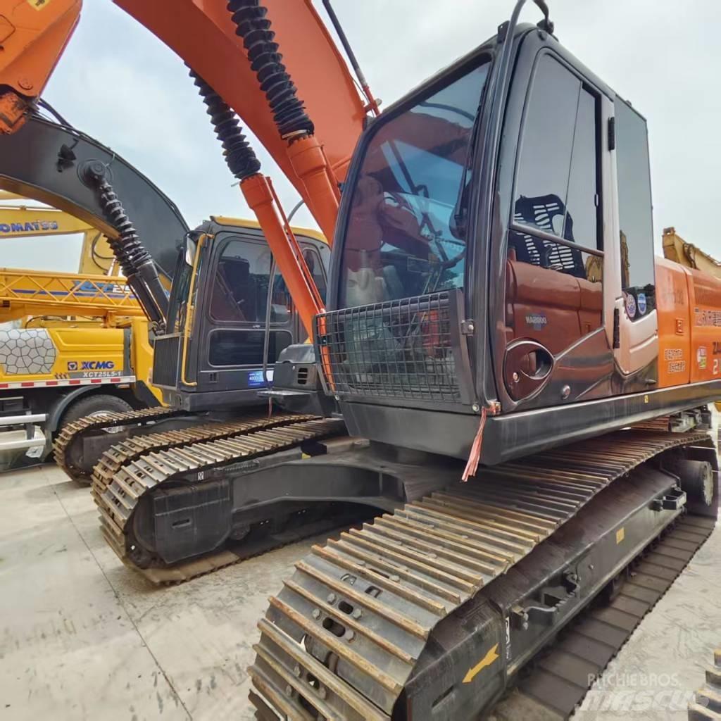 Hitachi ZX 210 Bandgrävare