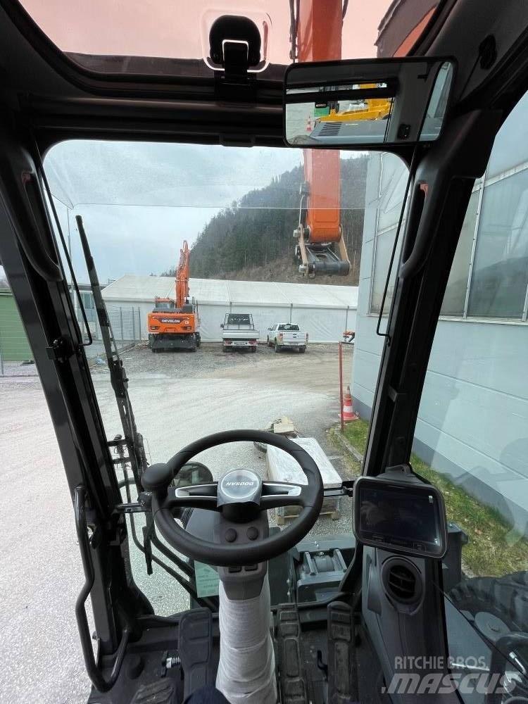 Develon DX 210 W-7 Grävmaskiner