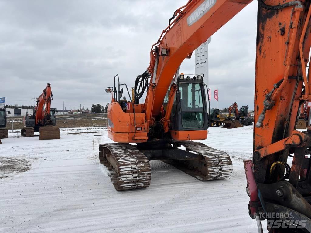 Doosan DX225 LC R Bandgrävare