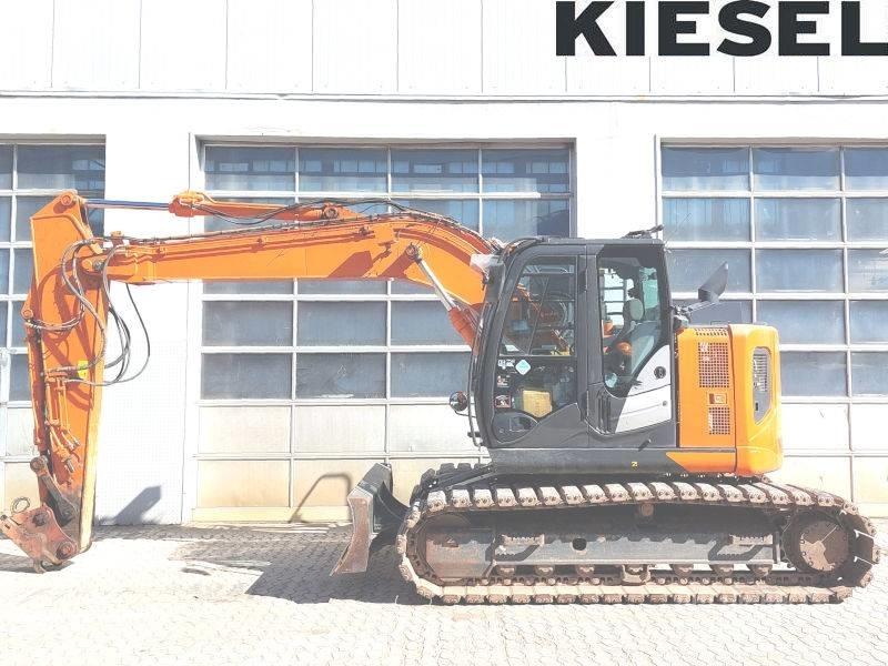 Hitachi ZX 135 US-6 Bandgrävare