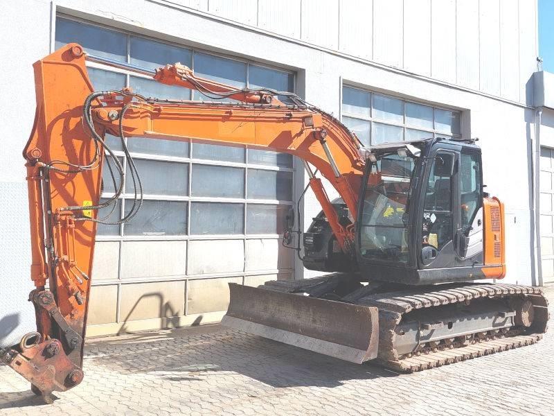 Hitachi ZX 135 US-6 Bandgrävare