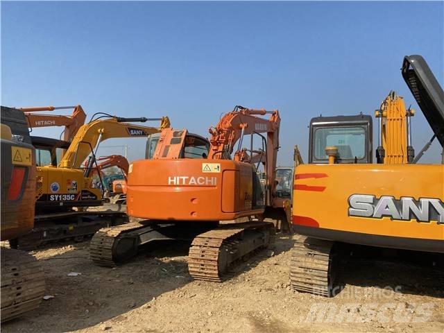 Hitachi ZX135US Bandgrävare