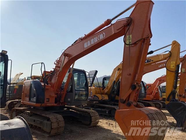 Hitachi ZX135US Bandgrävare