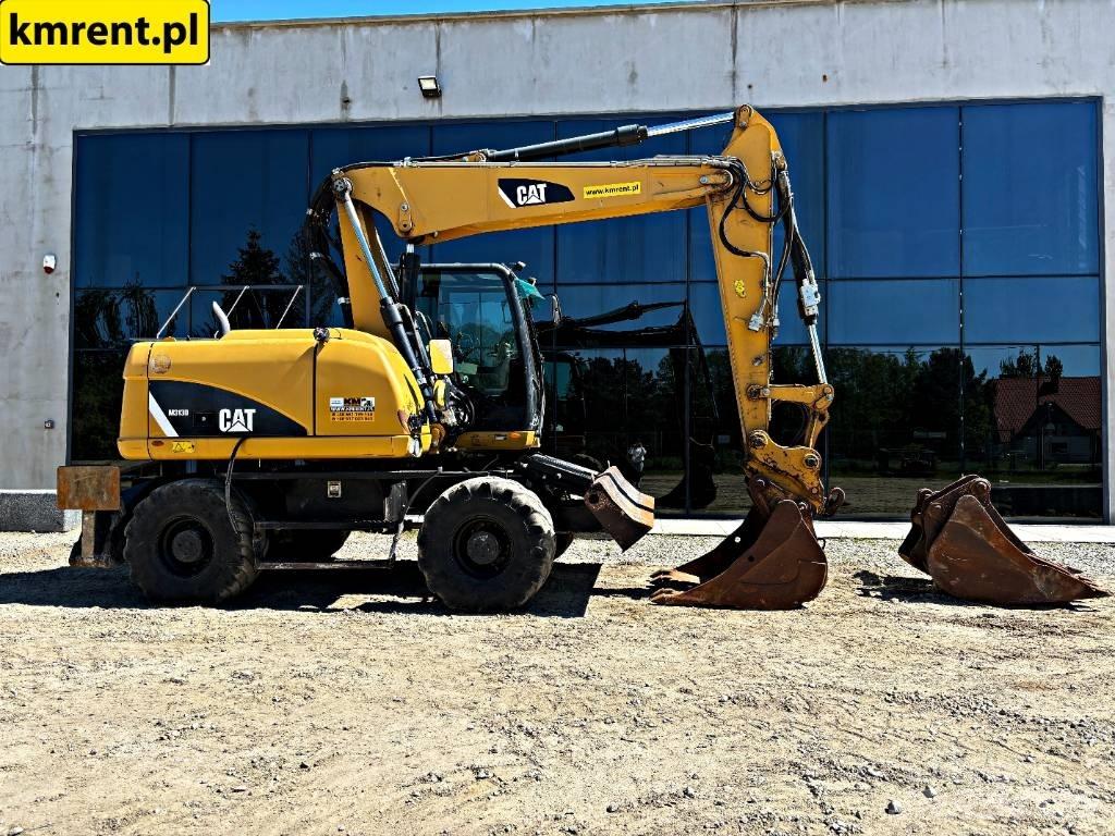 CAT M 313 D Hjulgrävare