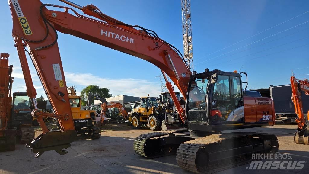 Hitachi ZX 210 Bandgrävare