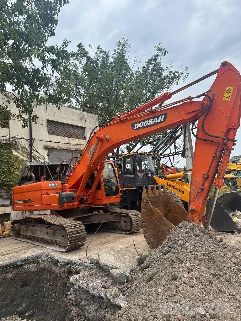 Doosan DX300 Bandgrävare