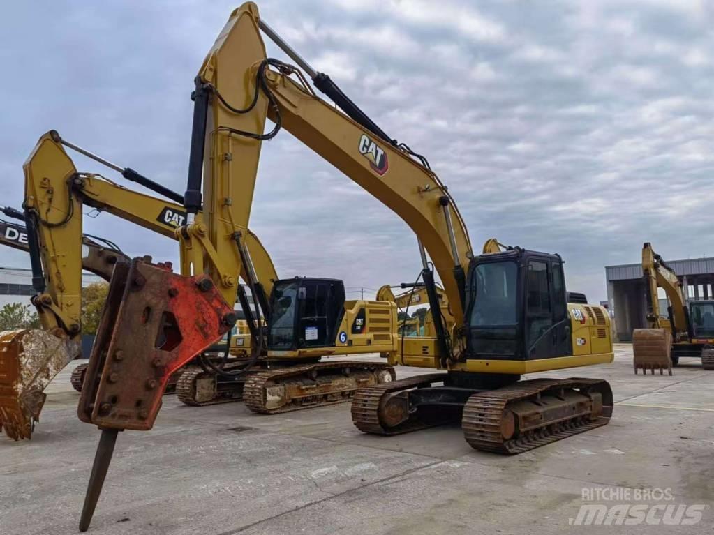 CAT CAT 323GX Bandgrävare