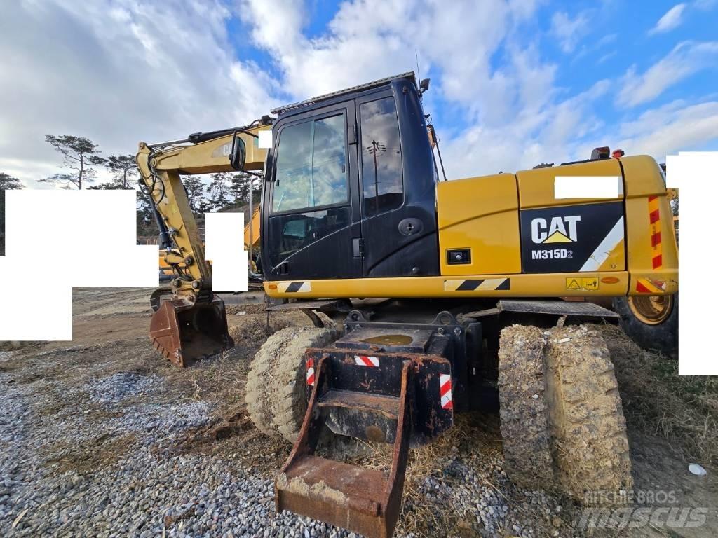CAT M 315 D Hjulgrävare