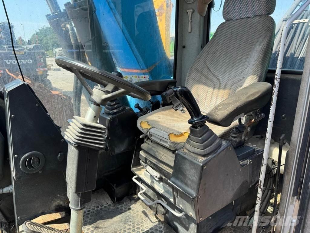 Fuchs MHL 320 Avfalls / industri hantering