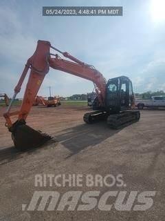 Hitachi ZX135US-6 Bandgrävare