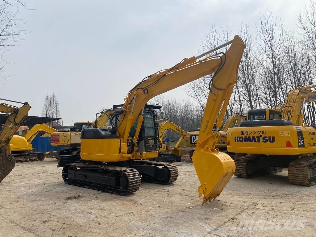 Komatsu PC128US Bandgrävare