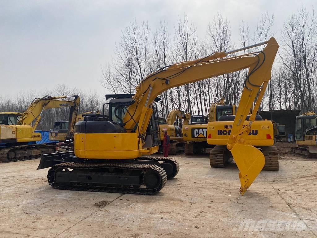 Komatsu PC128US Bandgrävare