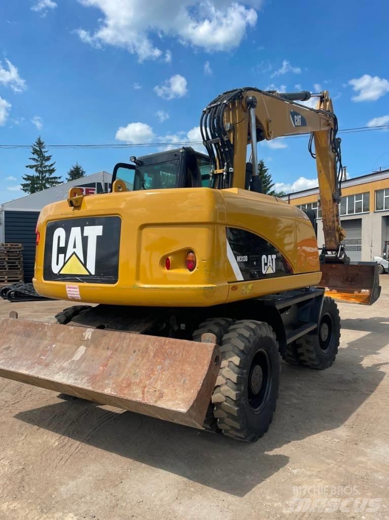 CAT M 313 D Hjulgrävare