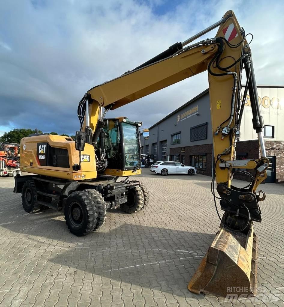 CAT M 318 F Hjulgrävare