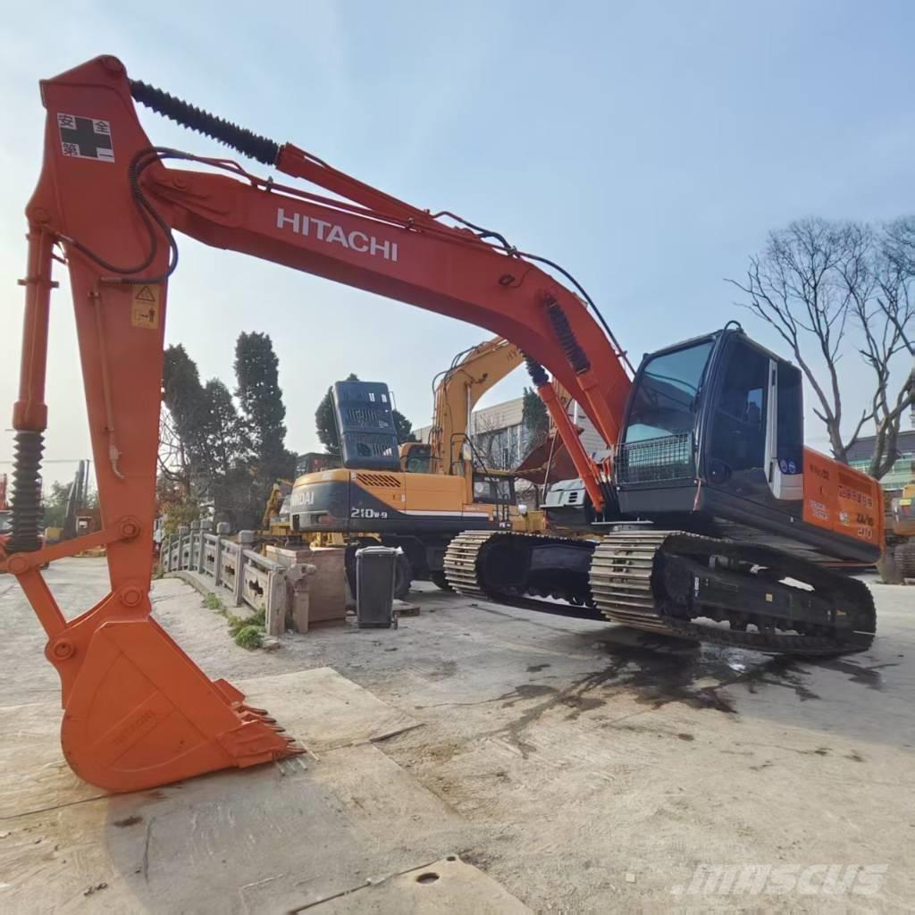 Hitachi ZX 210 Bandgrävare