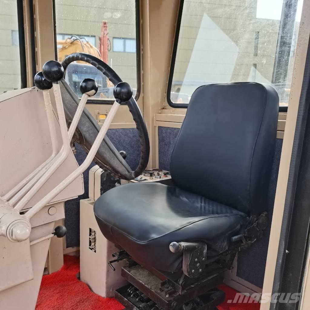 CAT 140k Väghyvlar