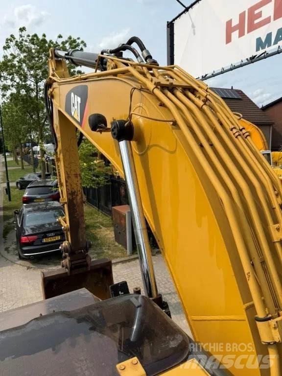CAT 320DL Bandgrävare