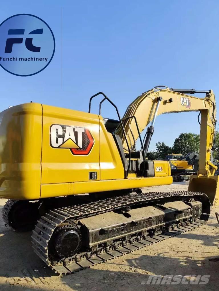 CAT 323 Bandgrävare
