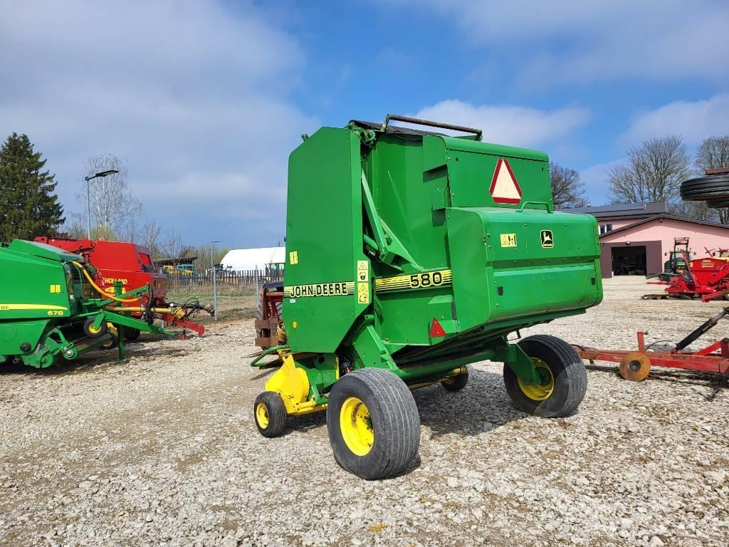 John Deere 580 Rundbalspressar