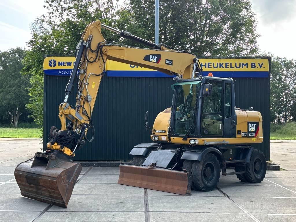 CAT M 313 D Hjulgrävare