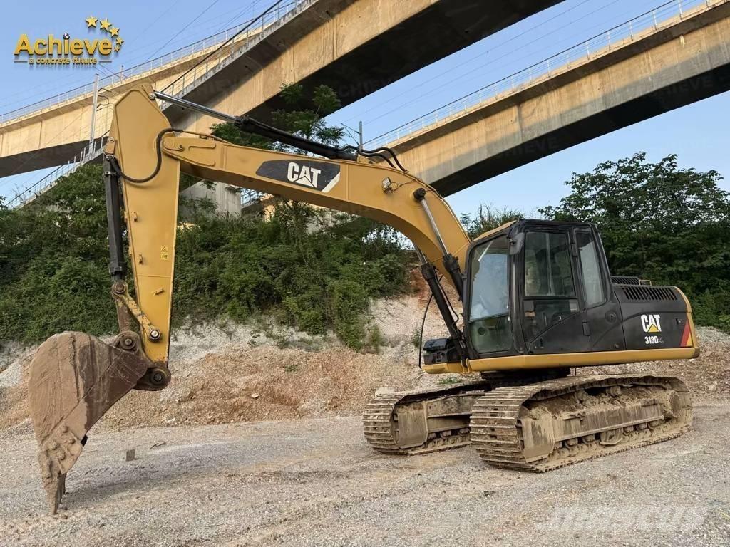 CAT 318DL Bandgrävare