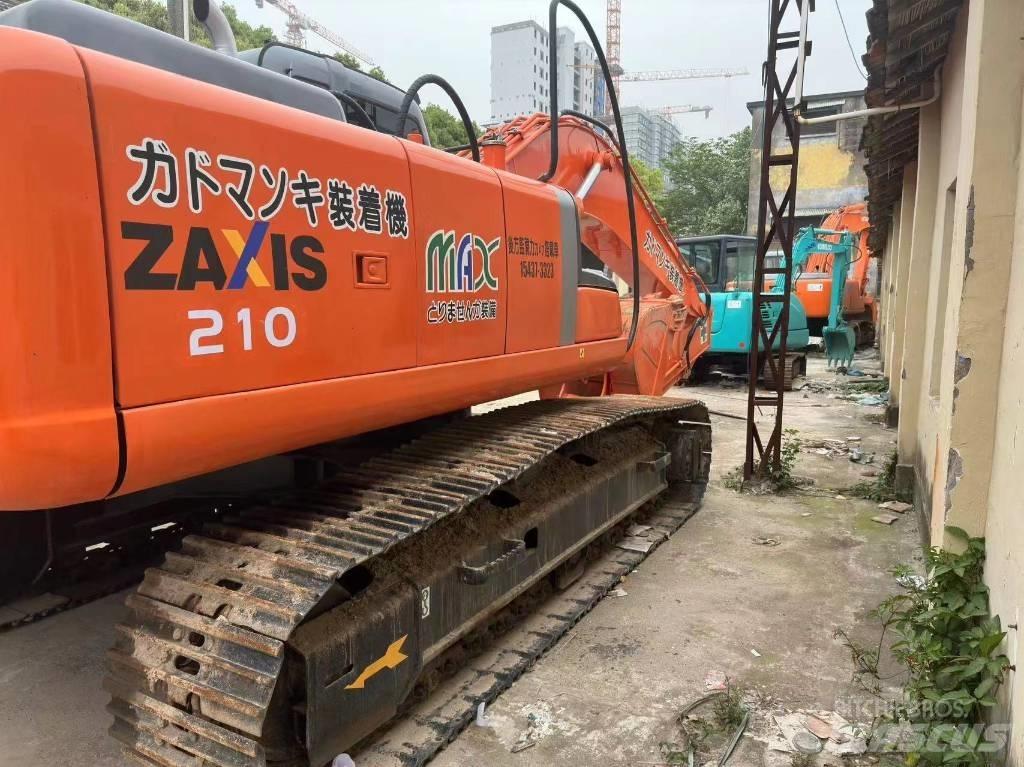 Hitachi ZX 210 Bandgrävare