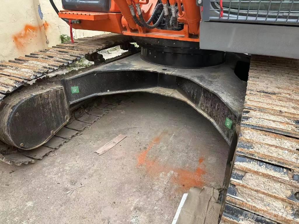 Hitachi ZX 210 Bandgrävare