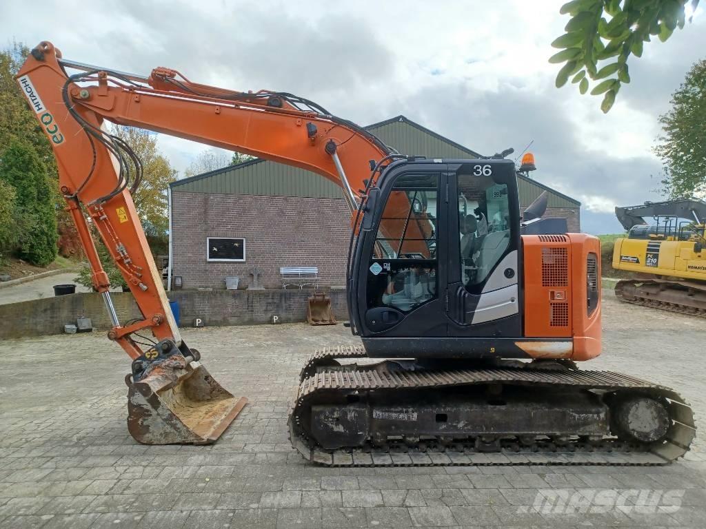 Hitachi ZX 135 US-6 Bandgrävare