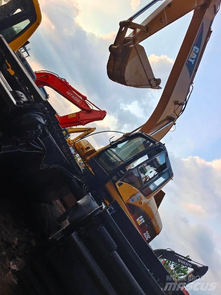 CAT 320 C Amfibiska grävmaskiner