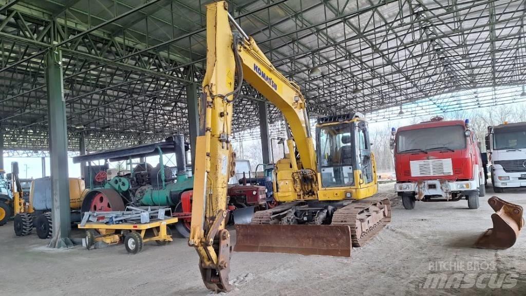 Komatsu 138US-8 Bandgrävare