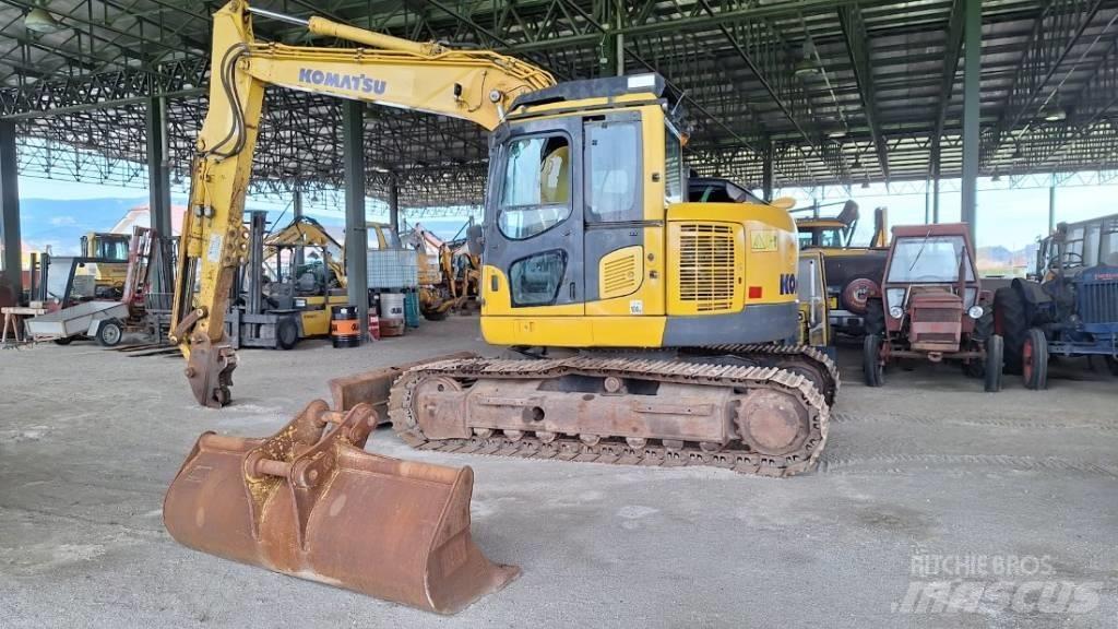 Komatsu 138US-8 Bandgrävare
