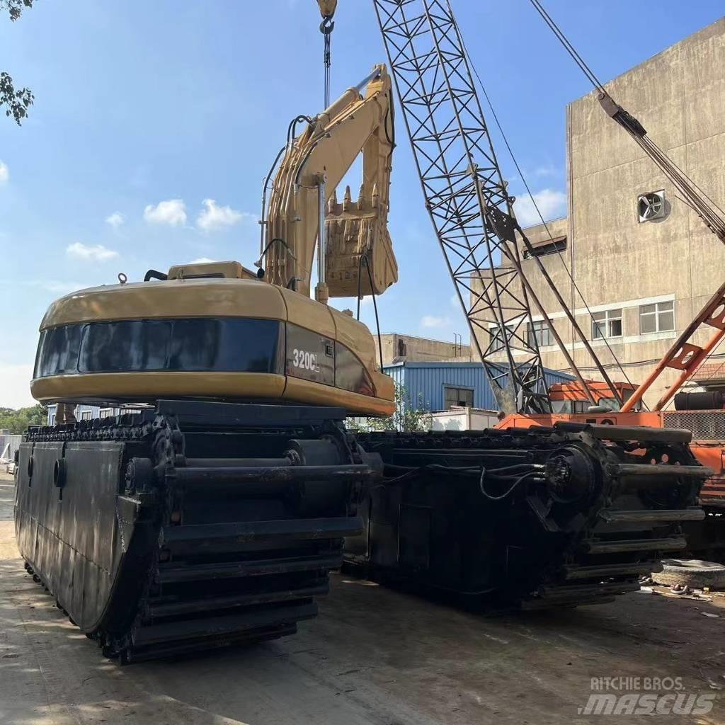 CAT 320 C Amfibiska grävmaskiner