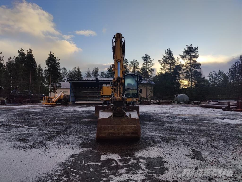 CAT M135 Hjulgrävare