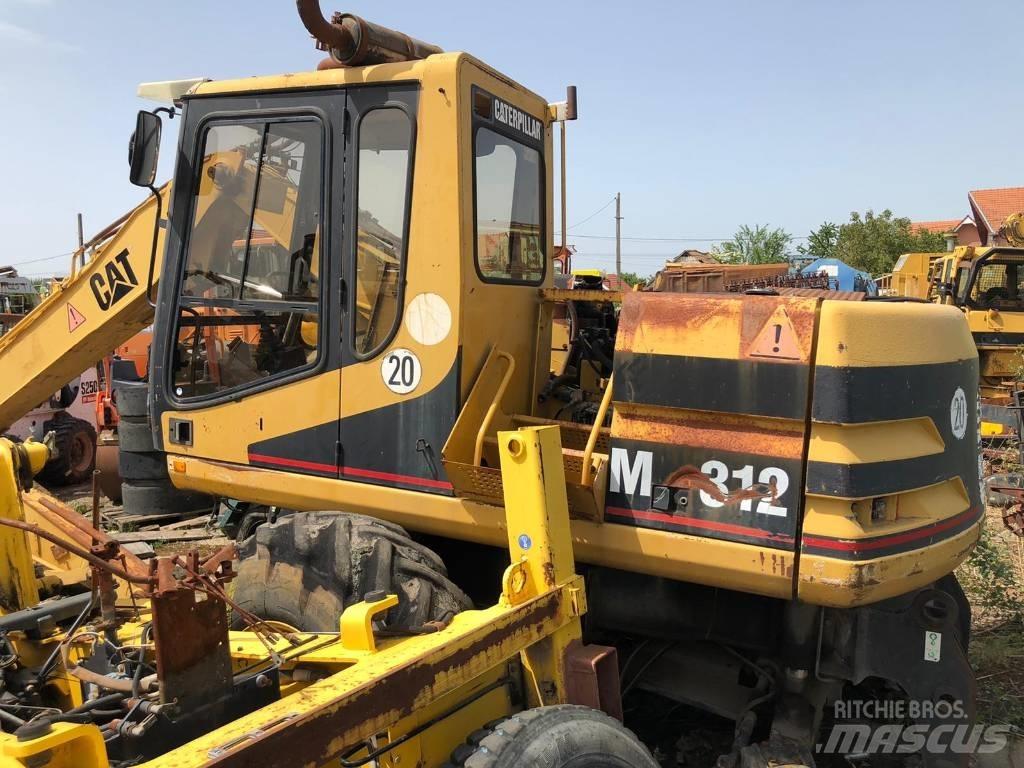 CAT M 312 FOR PARTS Hjulgrävare