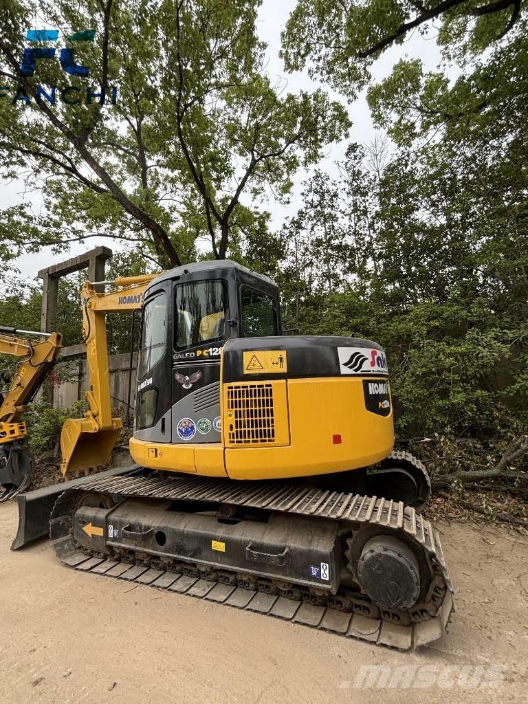 Komatsu PC128US Bandgrävare