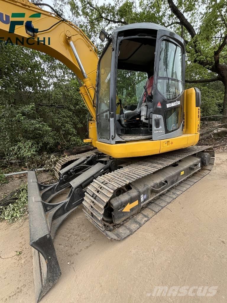 Komatsu PC128US Bandgrävare