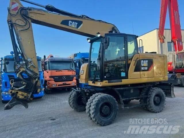 CAT M 318 F Hjulgrävare