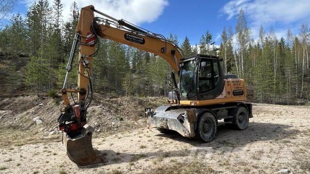 CASE WX 148 Hjulgrävare