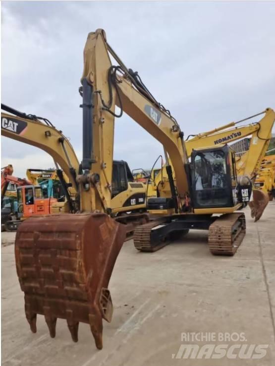 CAT 313 D Bandgrävare