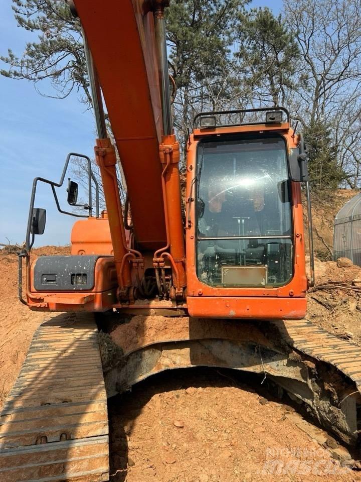 Doosan DX 220 LCA Bandgrävare