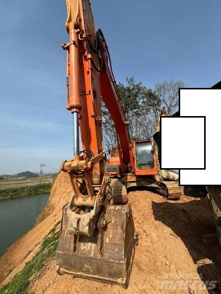 Doosan DX 220 LCA Bandgrävare