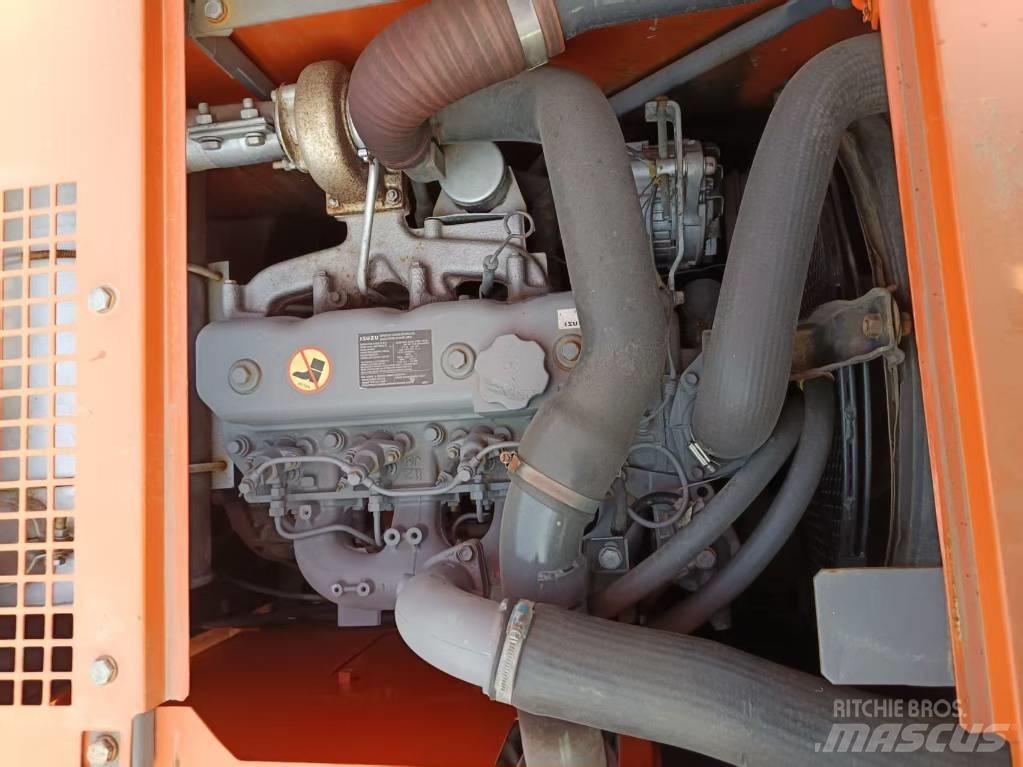 Hitachi ZX135 Bandgrävare